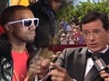 E! News Now - Colbert Wages Download War