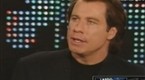 E! News Now: Travolta's Tragedy on Larry King