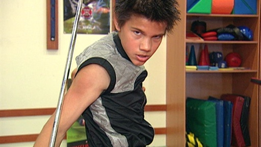 Taylor Lautner Punches & Kicks His Way t...