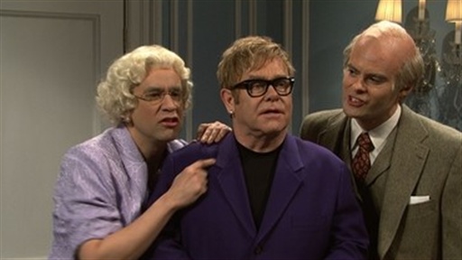 Elton Visits the Queen