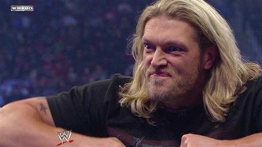 While addressing the WWE Universe, Chris Jericho is confronted by Edge.