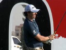 Quiros Leads at Halfway