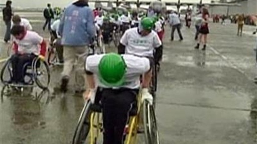 Wheelchairs Pull Plane in World Record Attempt