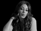 Mila Kunis Poses in a Bra & Black Swan Feathers for W Magazine