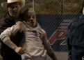 Wayne poses as the FBI. picture