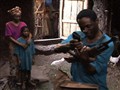 Onion News Network - Congo Approves Economic Stimulus Package of AK-47 for Every Citizen
